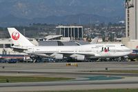 JA8076 @ LAX - Japan Airlines JA8076 taxiing from the International Terminal prior to departure from RWY 25R.