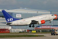 LN-RRO @ EGCC - SAS 737 lifting off from 06L. - by Kevin Murphy
