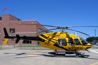 N721PH @ 3XS2 - Resting at hospital helipad waiting for the next call - by Andrea Bernardi