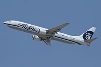 N317AS @ LAX - Alaska Airlines N317AS (FLT ASA292) departing RWY 25R enroute to Los Cabos Int'l (MMSD), Mexico.