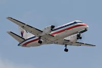 N398AM @ LAX - American Eagle N398AM (FLT EGF 42) on short final for RWY 24R concluding a 22-minute flight from Santa Barbara Municipal (KSBA), California.