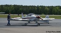 N914ES @ SFQ - Now the starboard side, and another admirer