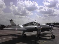 N6914L @ KHSA - Jim, Preflight - by Patty Hourin
