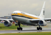 G-EOMA @ EGCC - Monarch A.330 leaving a very wet 24L. - by Kevin Murphy