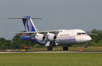OO-DJS @ EGCC - Just before touchdown on 06R. - by Kevin Murphy