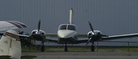 N111SM @ PVG - Head on near dusk, ready for the night - by Paul Perry