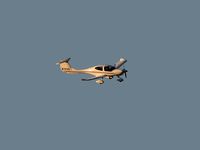 N252AX @ VGT - Q Group / 2004 Diamond Aircraft Ind Inc DA 40 / This little plane would never come close enough - just kept making fly-bys. So, this will have to do for now. You'll have to land sometime! - by SkyNevada - Brad Campbell