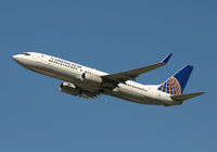 N14214 @ LAX - Conti's 737 zooming out of LA. - by Kevin Murphy