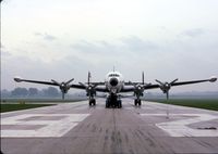 N6937C @ DPA - Towing out on an early, wet morning - by Glenn E. Chatfield