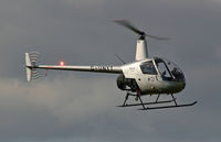 G-UNYT @ CVT - Robinson R-22B - by Les Rickman