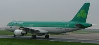 EI-CVC @ EGCC - dark overcast day - by mike bickley
