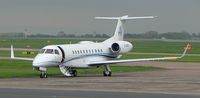 G-SIRA @ EGCC - door left open - and it rained heavily all day ! - by mike bickley