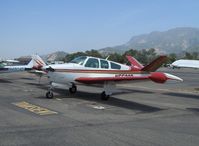 N5523D @ SZP - 1957 Beech H35 BONANZA, Continental O-470-G 240 hp, tip tanks increase range over original 40 gallons fuel, window mods - by Doug Robertson