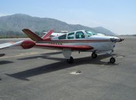 N5523D @ SZP - 1957 Beech H35 BONANZA, Continental O-470-G 240 Hp, tip tanks increase range over original 40 gallons fuel, window mods - by Doug Robertson