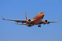 N766SW @ LAX - Southwest Airlines N766SW (FLT SWA1004) from Phoenix Sky Harbor Int'l (KPHX) on final approach to RWY 24R. - by Dean Heald
