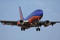 N234WN @ LAX - Southwest Airlines N234WN (FLT SWA969) from McCarran Int'l (KLAS) - Las Vegas, Nevada, on short-final for RWY 24R. - by Dean Heald