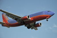 N309SW @ LAX - Southwest Airlines N309SW (FLT SWA2383) from Albuquerque Int'l Sunport (KABQ)-Albuquerque, New Mexico on final approach to RWY 24R. - by Dean Heald