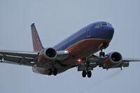 N660SW @ LAX - Southwest Airlines N660SW (FLT SWA2383) from Albuquerque  Int'l Sunport (KABQ) on short-final to RWY 24R. - by Dean Heald