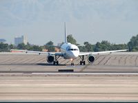 N939FR @ KLAS - Frontier Airlines - 'Penguins' / 2005 Airbus A319-111 - by SkyNevada - Brad Campbell