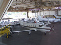 N74AX @ PDK - In Epps Air Service hanger with various other aircraft. - by Michael Martin