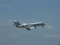 N343DF @ PDK - Departing PDK - Starting to rotate gear. - by Michael Martin