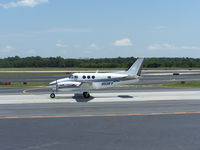 N511KV @ PDK - Taxing to Epps Air Service - by Michael Martin