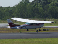 N9947C @ PDK - Taking off from 20R in strong winds - by Michael Martin