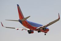 N221WN @ LAX - Southwest Airlines N221WN (FLT SWA259) from Chicago Midway Int'l (KMDW) on short-final to RWY 24R.