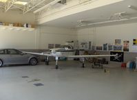 N313CH @ SZP - 1991 Hautamaki GLASAIR III SH-3R, Lycoming IO-540, in hangar, Vicki's 'Cruse Missile' Sport Class Reno racer - by Doug Robertson