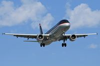 N166US @ LAX - US Airways N166US (FLT USA21) from Philadelphia Int'l (KPHL) on final approach to RWY 24R. - by Dean Heald