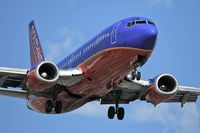 N312SW @ LAX - Southwest Airlines N312SW (FLT SWA1385) from Metropolitan Oakland Int'l (KOAK) on final approach to RWY 24R.