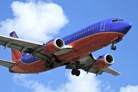 N312SW @ LAX - Southwest Airlines N312SW (FLT SWA1385) from Metropolitan Oakland Int'l (KOAK) on final approach to RWY 24R.
