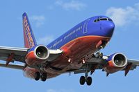 N496WN @ LAX - Southwest Airlines N496WN (FLT SWA433) from Salt Lake City Int'l (KSLC) on final approach to RWY 24R. - by Dean Heald
