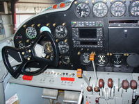 N411J @ KJVL - Beech D18S - by Mark Pasqualino