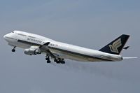 9V-SMV @ LAX - Singapore Airlines 9V-SMV (FLT SIA11) climbing out from RWY 25R enroute to Narita Int'l (RJAA), trailing brake dust.