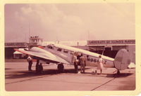 N9887Z @ KCMI - Taken by my Great Grandfather (co-pilot) between 1959-1960 while it was being used by the Illinois State Water Survey for studying the effects of Electricity on Thunder storm cell propagation. - by Ronald Custer