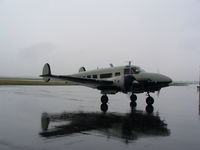 N223JW @ KJVL - Beech H18