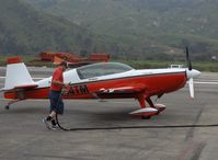 N444TM @ SZP - 2002 Extra Flugzeugbau Gmbh EA-300L, Lycoming AEIO-540, refueling - by Doug Robertson