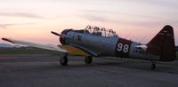 N26808 @ N51 - This immaculate SNJ-4 takes in the last rays of a spring day. - by Daniel L. Berek