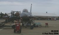 86-0246 @ LFI - Didn't need the lawnchairs under the wing for shade, but instead as a rain-break!