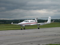 N247CS @ FDK - taxiing in to assume it's place at the static diplay AOPA Fly-In 2006 - by Sam Andrews