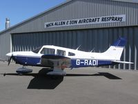 G-RADI @ EGBT - Newly painted PA-28 outside the spray shop