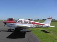 G-BSGD @ EGBT - PA-28 parked in the sun at Turweston - by Simon Palmer