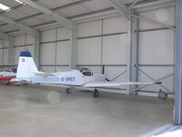 G-ONES @ EGBT - Slingsby T67 sitting in the hangar at Turweston