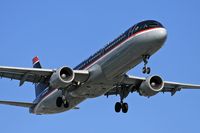 N185UW @ LAX - US Airways N185UW on final approach to RWY 24R. - by Dean Heald