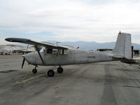 N681RL @ CNO - all silver 1956 straight tail Cessna 172 (port side) @ Chino Municipal Airport, CA - by Steve Nation