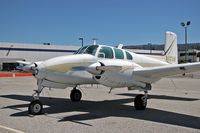N154N @ TOA - 1955 Beech C-50 Twin Bonanza N154N on the ramp at Torrance Municipal Airport (KTOA), CA.