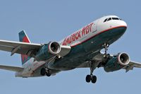 N828AW @ LAX - America West Airlines N828AW (FLT AWE107) from Las Vegas McCarran Int'l (KLAS) on final approach to RWY 24R.