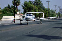 N500AX @ KPSP - Adam Aircraft A500 at AOPA2002 Palm Springs - by Jeff Sexton