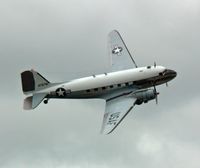 N8704 @ RDG - Yankee Doodle Dandy shows off her sleek lines against a brooding gray sky. - by Daniel L. Berek